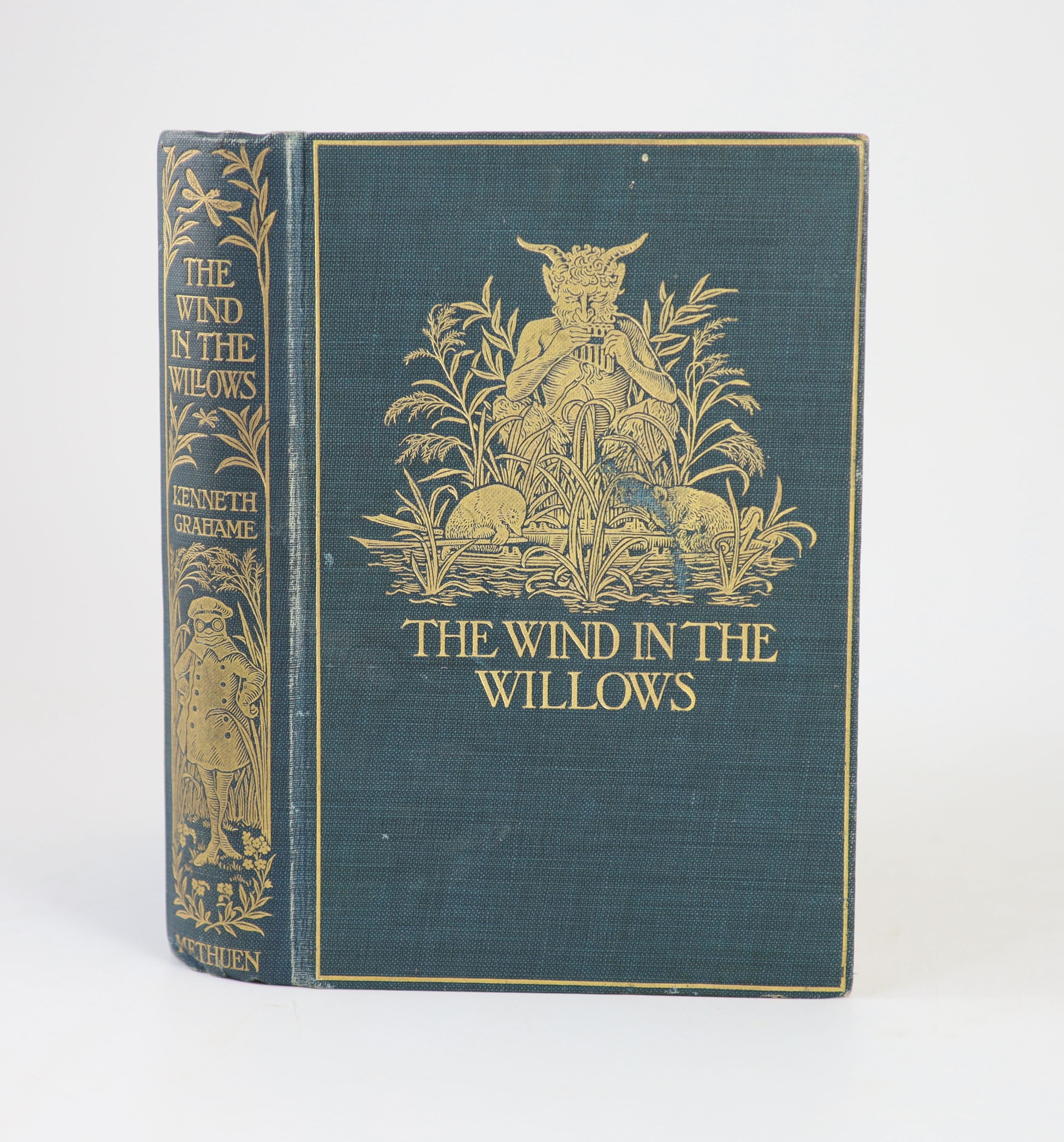 Grahame, Kenneth - The Wind in the Willows, 1st edition, 8vo, original blue green pictorial cloth, depicting The Piper at the Gates of Dawn, half title, tissue guarded frontis by Graham Robertson, top edge gilt, others d